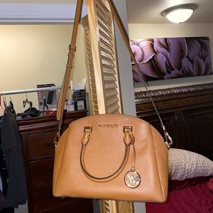 Coach, Michael Kors, and Disney purses